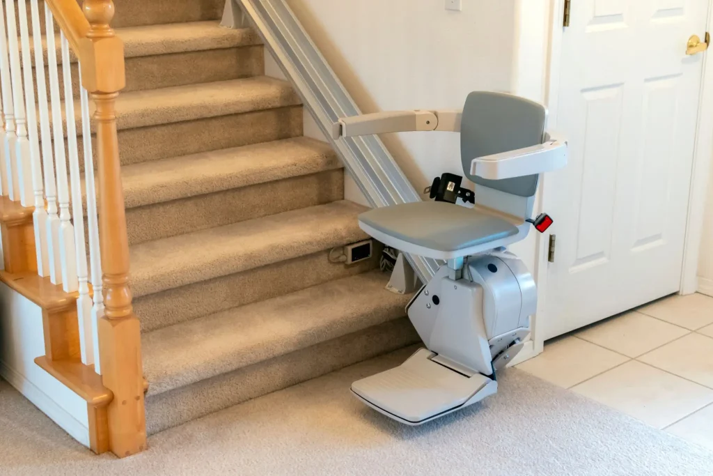 A standard straight stair lift mounted directly to the stair treads